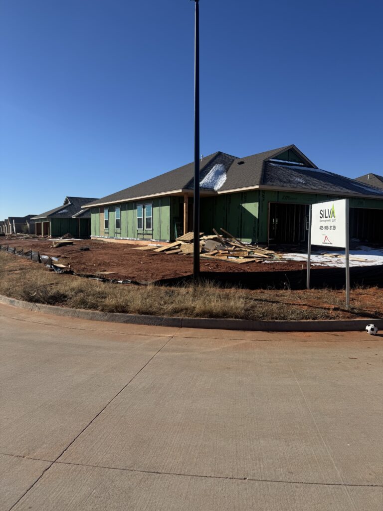 A jobsite with duplexes under construction.